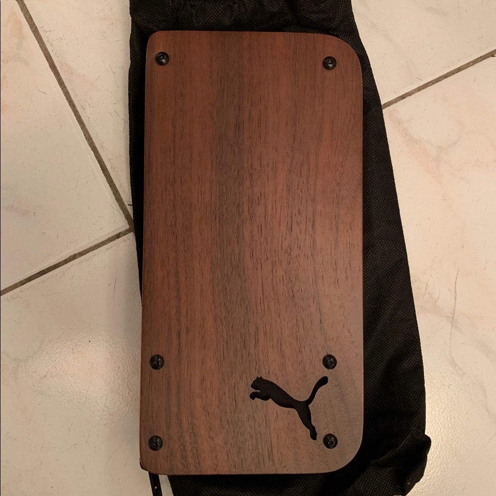 NWOT wooden Puma travel clutch.